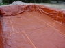Bâchage de l'ensemble du terrassement par polyane épais.