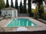 Ensemble piscine et local technique.